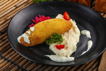 Chicken Kiev cutlet with puree
