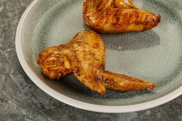 Tasty roasted chicken wing with spices