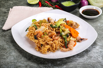Asian cuisine - Fried noodles with seafood