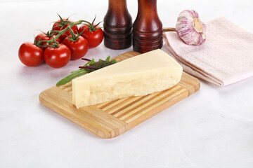 Piece Italian hard parmesan cheese