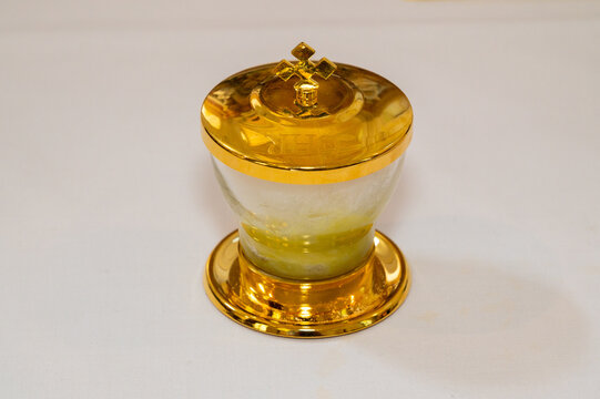 pot with holy chrism oil for babtism