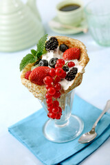 Crepes with berries and yogurt.