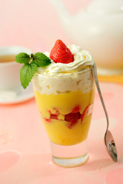 Cream dessert with strawberries.