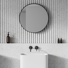 Modern bathroom sink with wall-mounted faucets and a round mirror against a striped wall, concept of a minimalist interior design. 3D Rendering