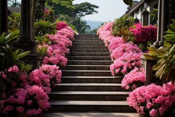 cascade of a tropical waterfall amidst a vibrant garden, adorned with blooming pink flowers