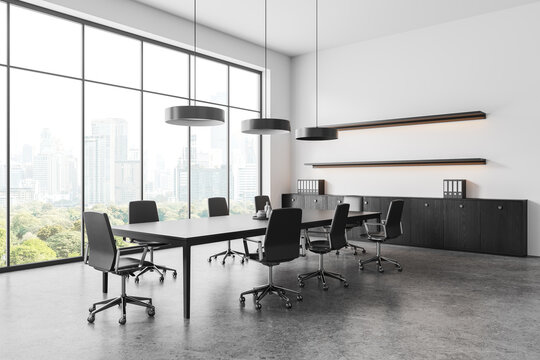 Minimalist office room interior meeting table and armchairs, panoramic window