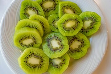 Kiwi slices on a white background