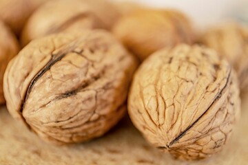 Close-up shot of ripe and shelled walnuts