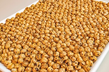 Plate of ready-to-eat yellow chickpeas