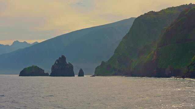 The Ilheus da rib arch, on the coastline of Ribeira da Janela at sunset in Madeira, Portugal