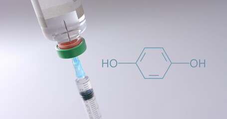 Element structure diagram over syringe in vaccine vial