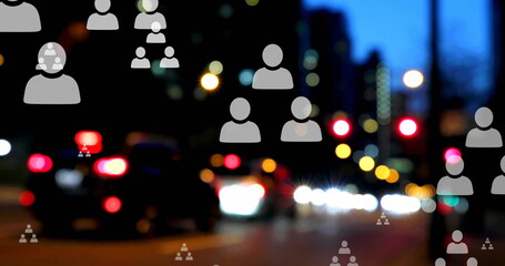Image of profile icon flowcharts over blurred vehicles stopped on red signal in street of city