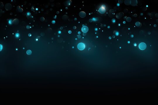 Cyan abstract glowing bokeh lights on a black background with space for text or product display