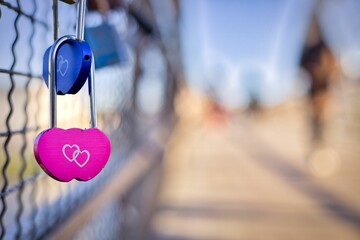 Heart-shaped lock on the fence - the symbol of love