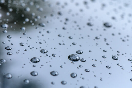 Raindrops on the surface of the car glass. Raindrops natural abstract background. 3