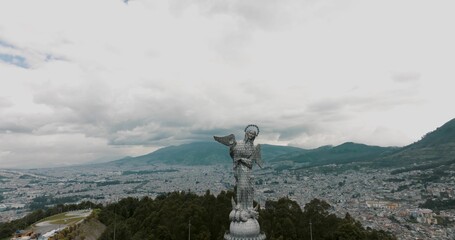 Aerial shot of the Statue of the Holy Virgin on El Panecillo mountain peak in Quito, Ecuador