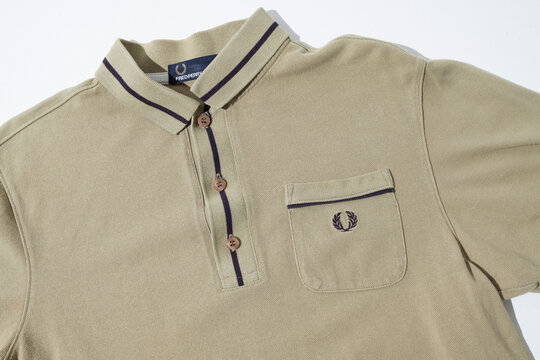kent, uk, 01.01.2023 vintage fred perry cotton flannel vintage retro polo shirt. British iconic fashion label garment t-shirt clothing. Streetwear and tennis apparel