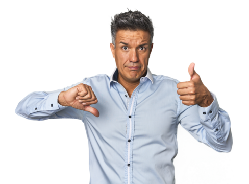 Middle-aged Latino man showing thumbs up and thumbs down, difficult choose concept