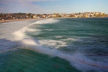 View of Bondi beach with foamy waves in the background, Sydney, New South Wales, Australia