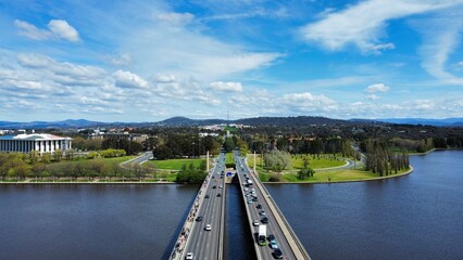 Aerial view of Commonwealth avenue bridge over Burley Griffin lake in Canberra, Australia