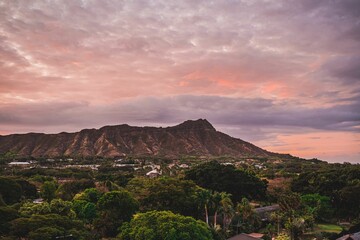 Fototapeta na wymiar Landscape of a beautiful sunset over Paradise Cove Luau, Hawaii.