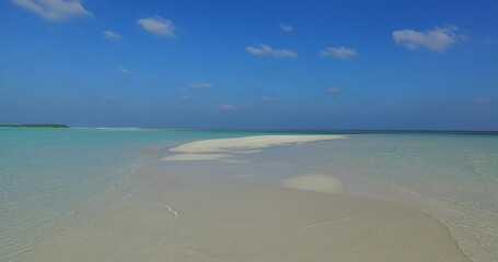 Obraz premium Aerial of sea with emerald water in Maldives