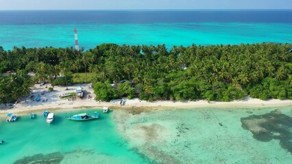 Aerial drone shot of an untouched paradise island in the Southeast Asia
