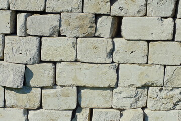 texture of stacked gray industrial old broken building concrete hard blocks