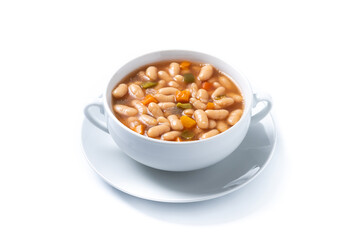 White beans soup with vegetables in white bowl isolated on white background