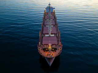 Large bulk carrier cargo ship Floating on Vast Water