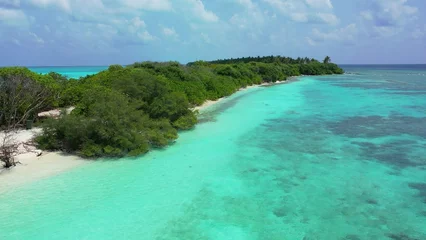 Plexiglas foto achterwand Aerial view of a landscape in the Maldives © Wirestock