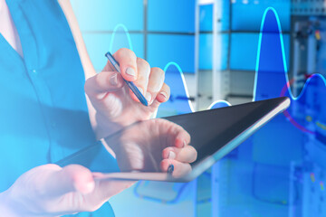 Tablet computer in hands of woman. Analytical chart. Cropped woman business analyst. Tablet with...