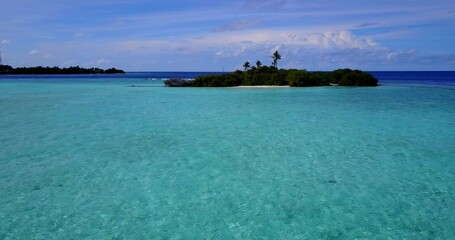 Beautiful view of a sea with an island on a sunny day in Asia