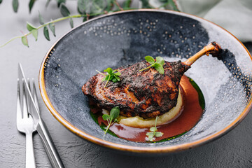 Gourmet duck confit on elegant plate