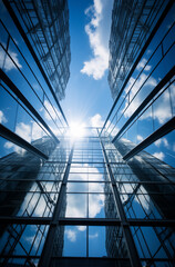 Obraz premium Modern office building with blue sky and clouds. City ceneter concept.