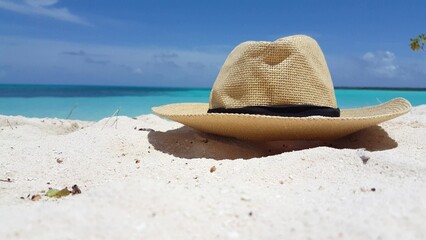 Beautiful view of a beach hat on the sand by the sea in Asia