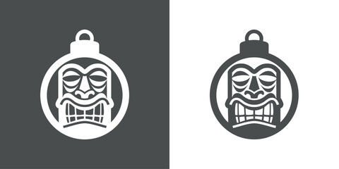 Navidad en Hawái. Logo con silueta de bola de navidad con  máscara tiki para tarjetas y felicitaciones