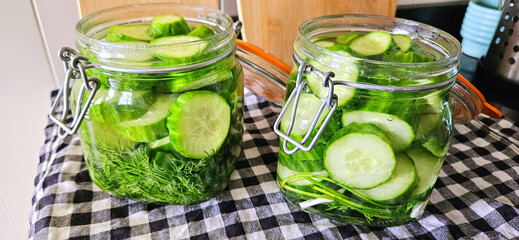 Canning cucumbers, homemade preparations. Pickling cucumbers in glass jars. Delicious and beautiful homemade food