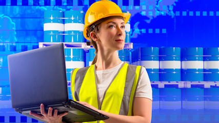 Logistician woman. Girl near oil barrels. World map symbolizes international logistics. Logistician with laptop in hands. Woman dispatcher transport company. Logistician in yellow uniform and helmet