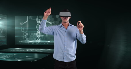 Image of businessman wearing vr headset over screens with medical data processing