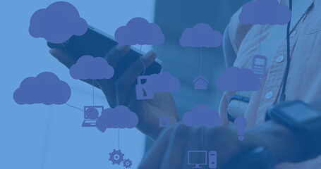 Image of clouds with electronic devices over caucasian man using smartphone