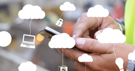 Image of clouds with electronic devices over caucasian man using smartphone