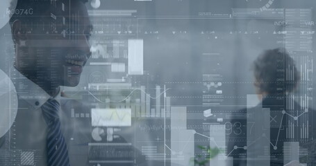 Image of financial data over happy biracial businessman