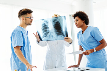 doctor hospital team medical x-ray x ray radiology lung chest diagnisis disease health medicine healthcare meeting teamwork  clinic