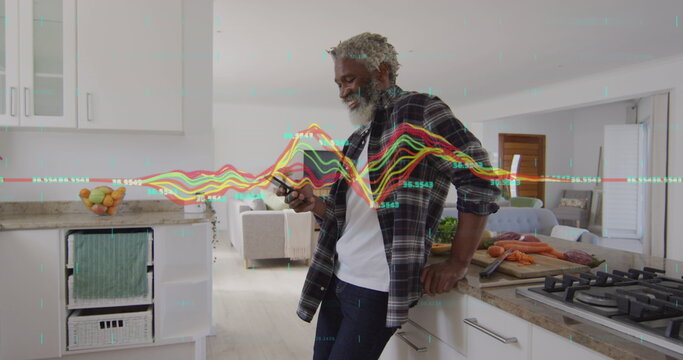 Image of data processing over african american businessman using smartphone - Powered by Adobe