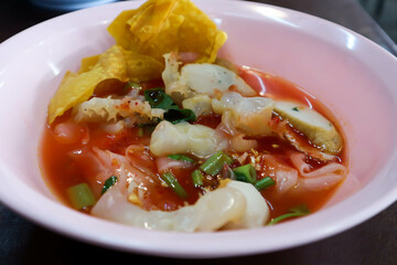 noodles with fish ball , jellyfish and fried wonton