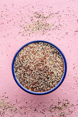 Quinoa mix. Mixed white, red and black quinoa seeds in a bowl, top shot