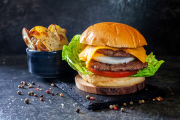 Burger with fries, smash burger in black background