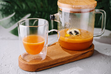 Freshly blended fruit smoothie pouring into glass