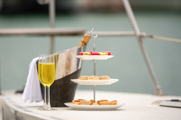 Rich man sleep lying in yacht ship for eat Afternoon tea and champagne . yachting man relax with...